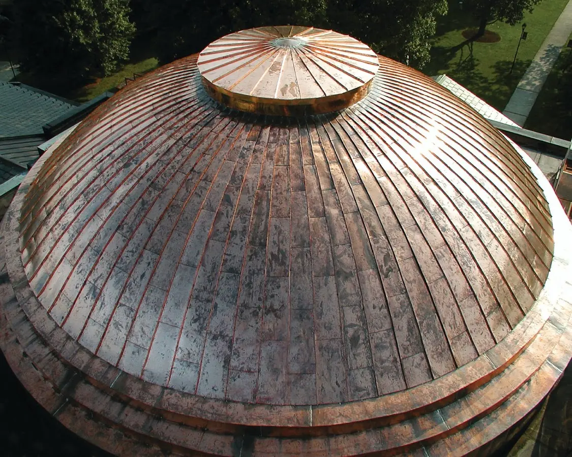 Craftsman Roofing crew installing a new roof in Manchester